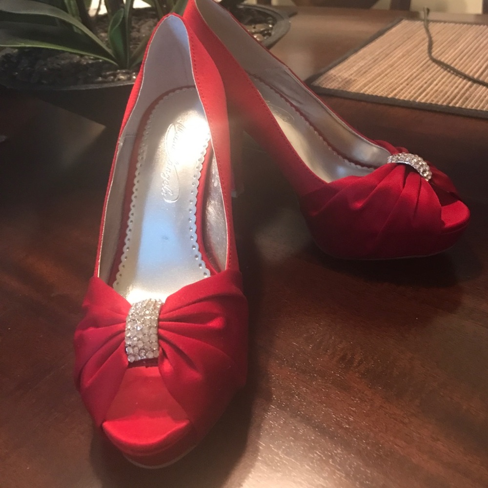 Red satin shoes with rhinestone detail