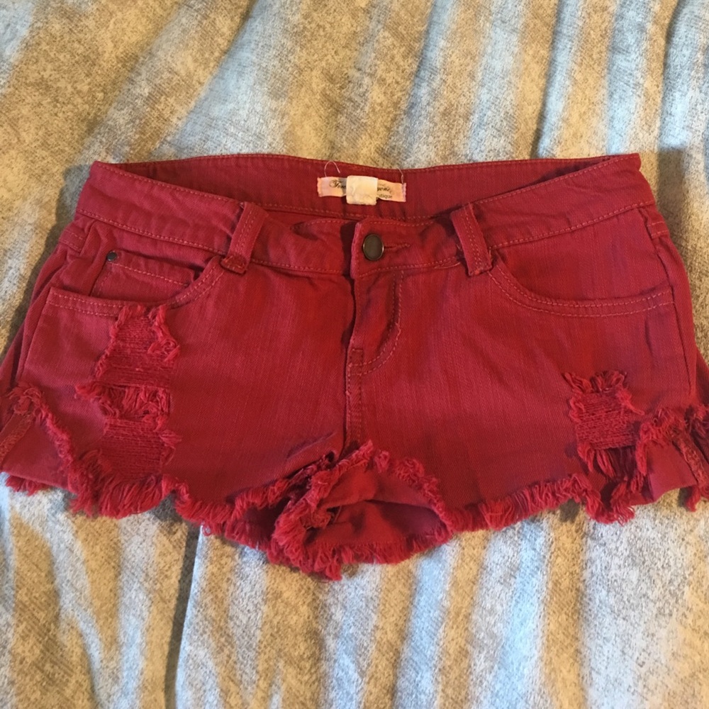 Red denim distressed shorts