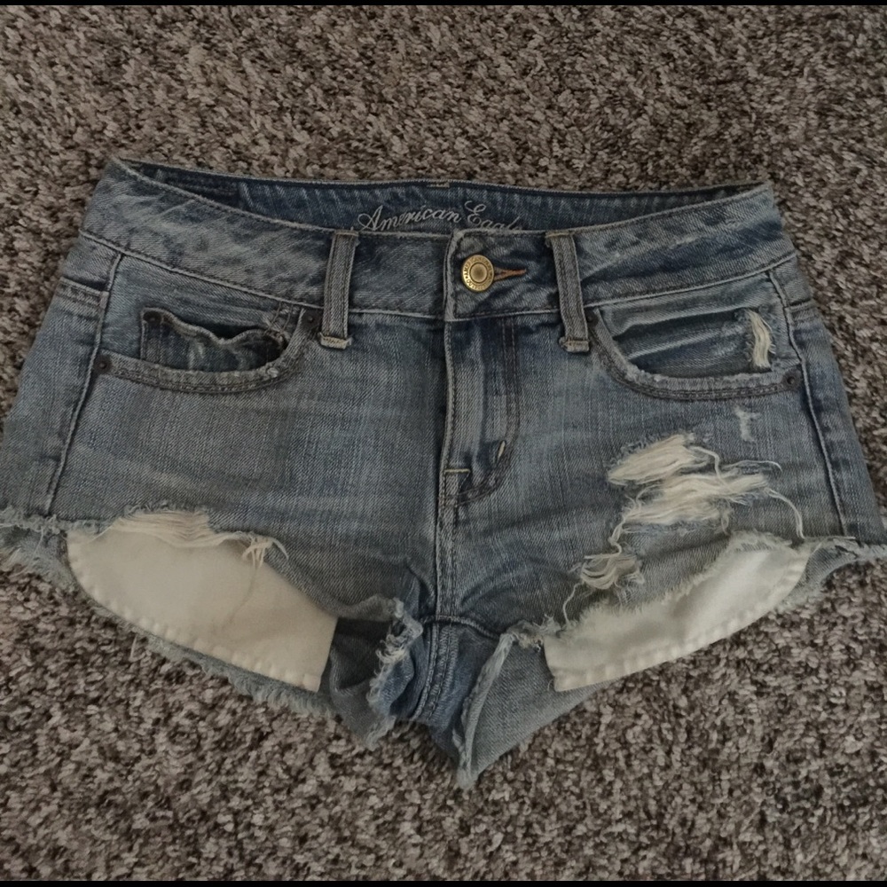 Distressed denim shorts