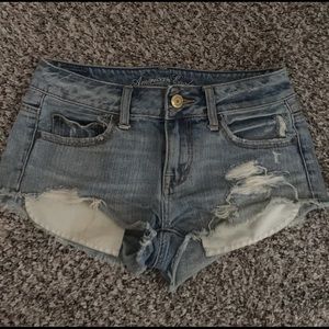 Distressed denim shorts