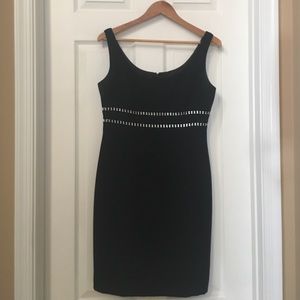 Black cocktail dress with rhinestone accent