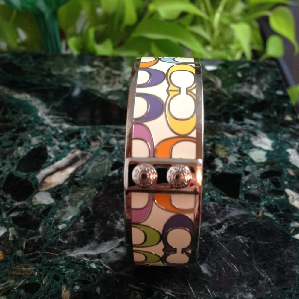 Coach Bracelet signs of wear on the inside only.