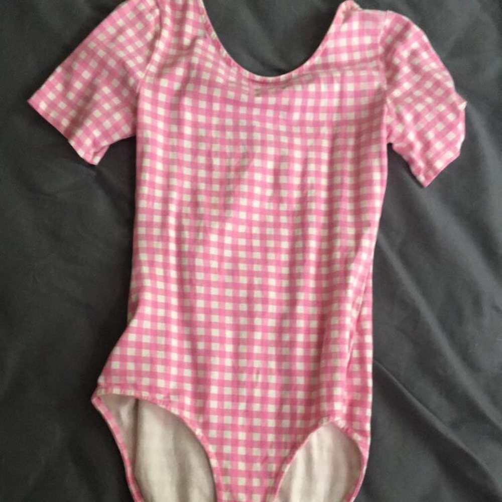 Pink and white checkered body suit