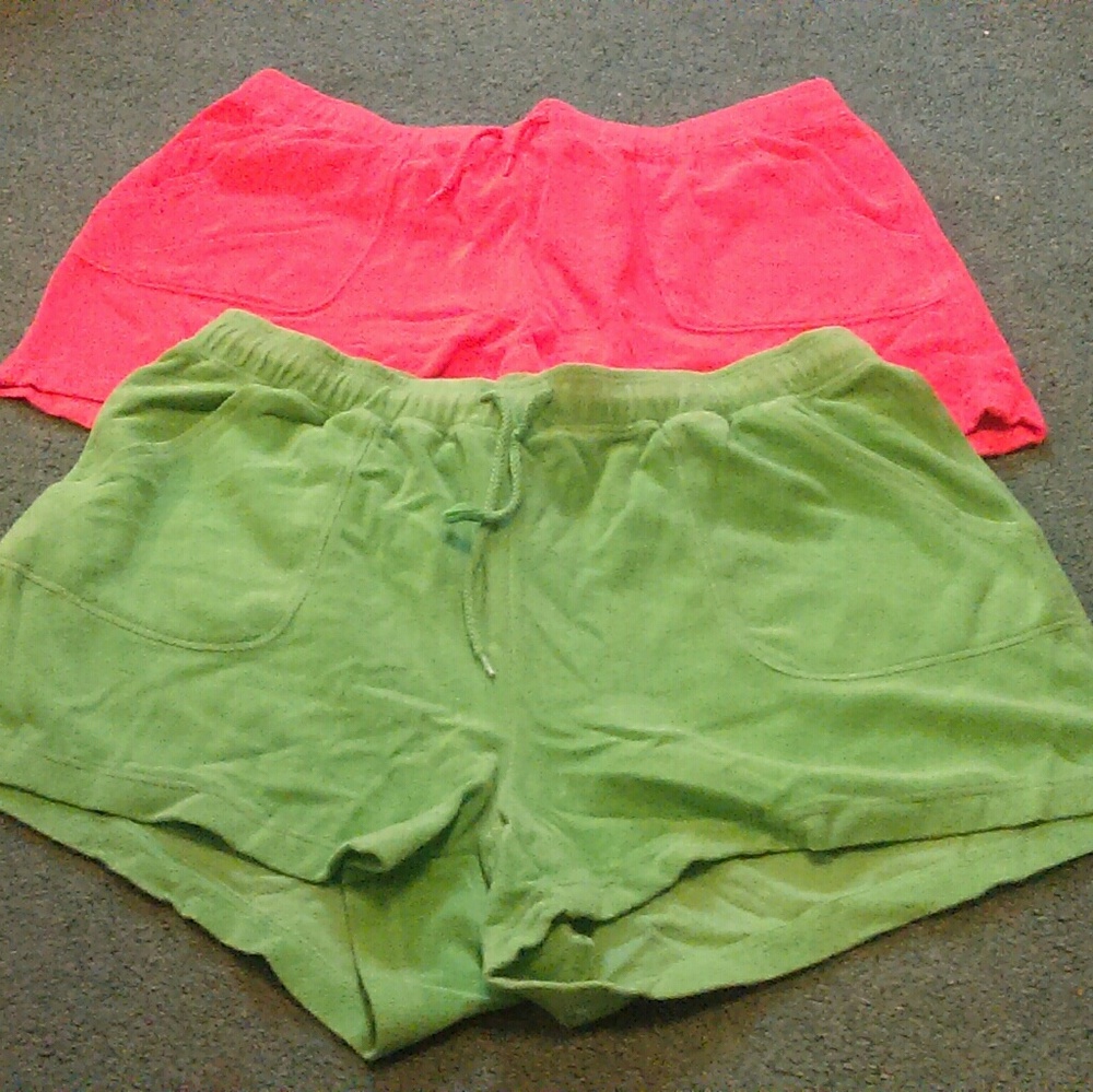 2 pairs of Terry cloth shorts with pockets.