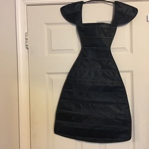 Dress shaped jewelry organizer. Hangs. Never used