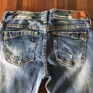 Express lightly distressed skinny jeans