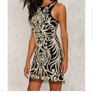 GIVE IT A SWIRL EMBELLISHED MINI DRESS