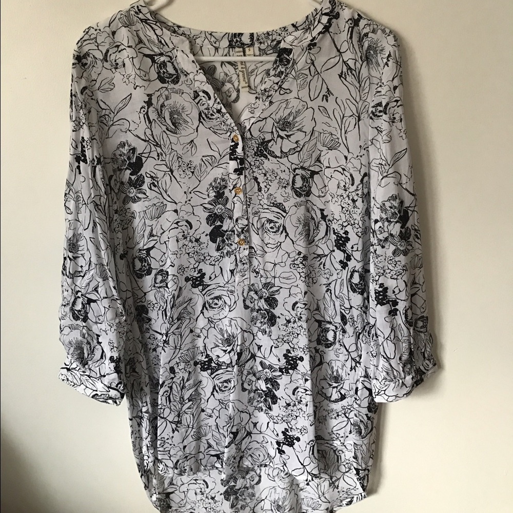 White and black floral blouse