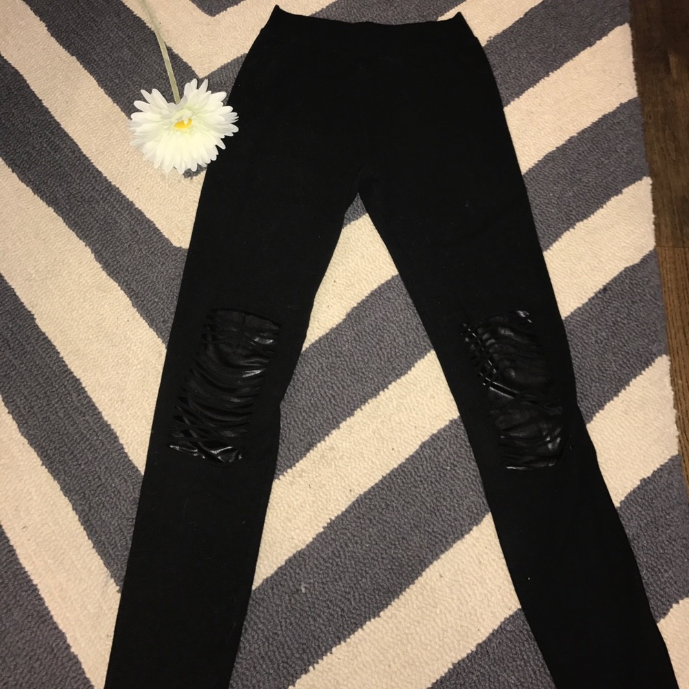 Black ripped leather leggings