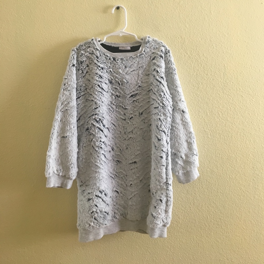 Girls furry long sleeved sweater age 9