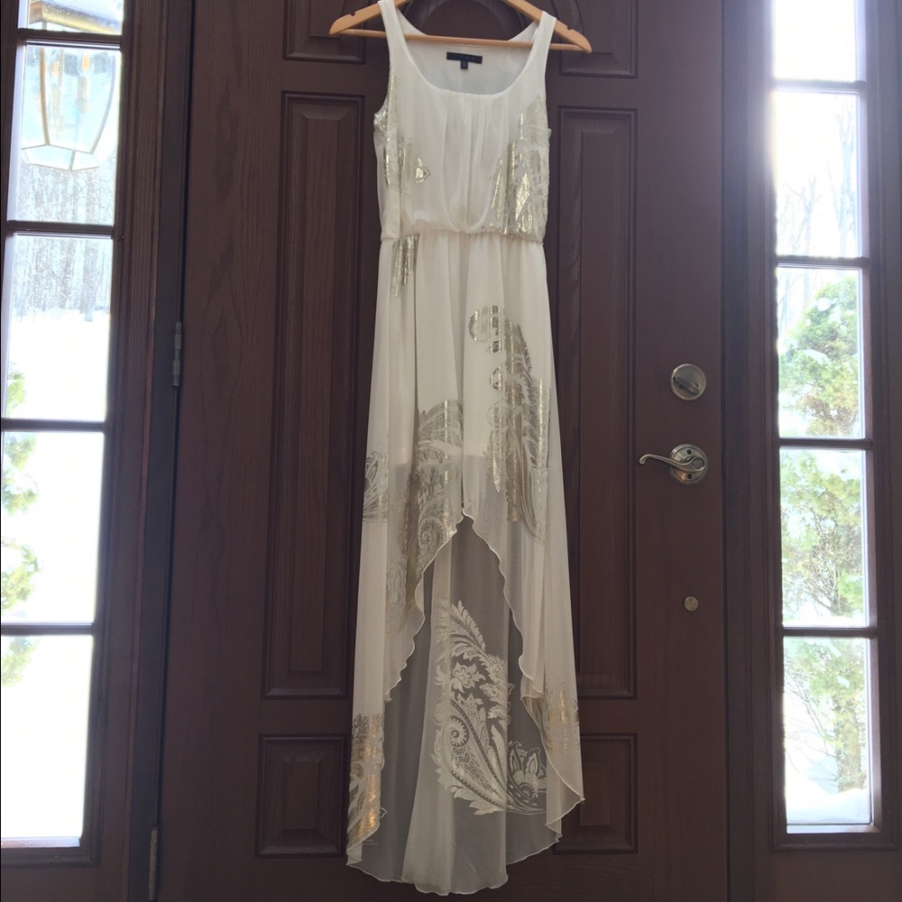 White gown with silver foil design