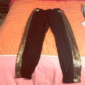 Black and gold sequined joggers