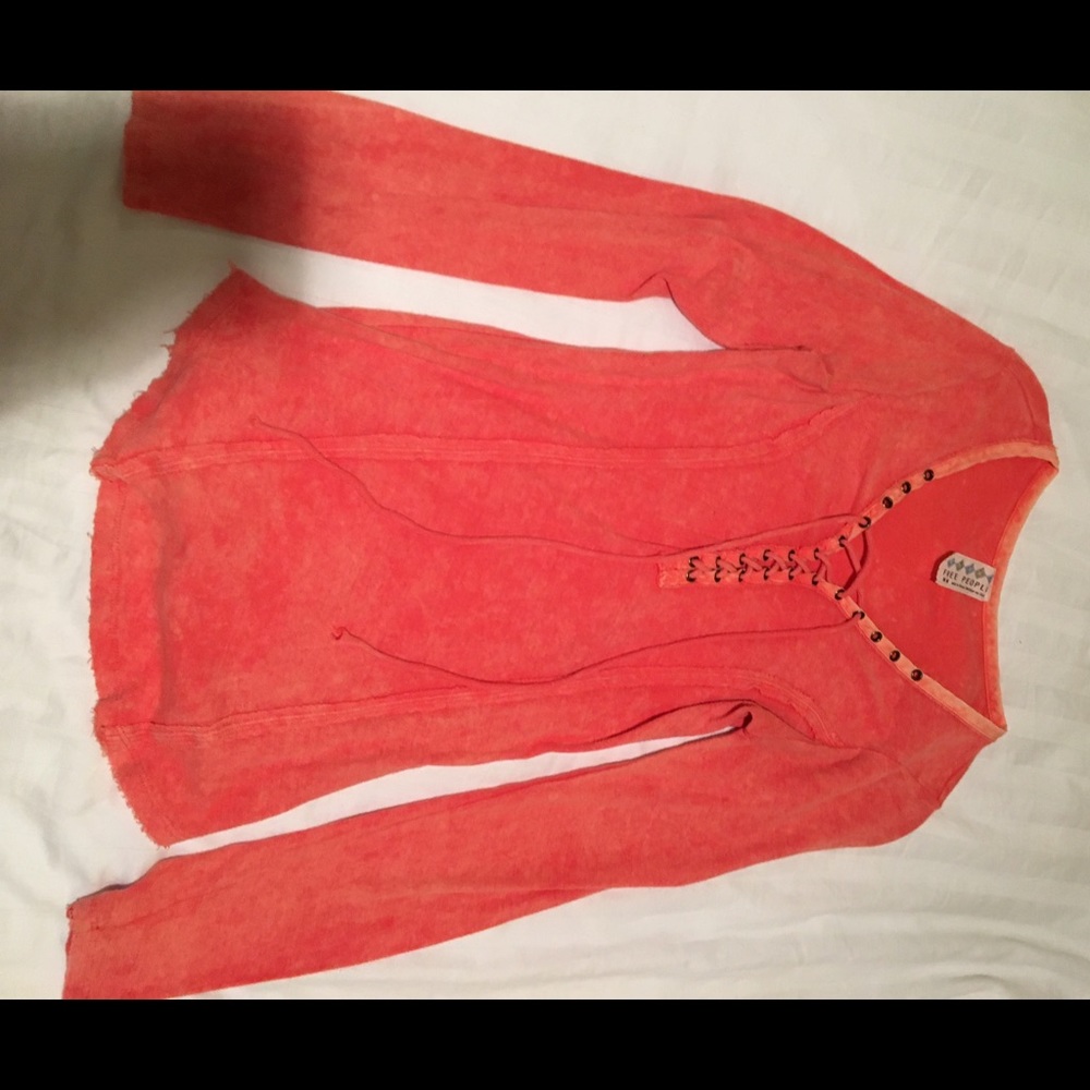 Free People Orange lace up top. Only worn once!