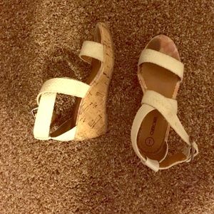 White braided wedge shoe.