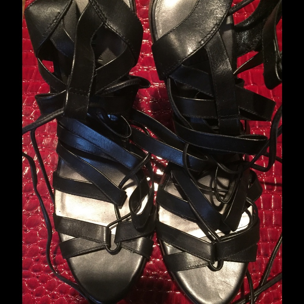 Black leather platform shoes.