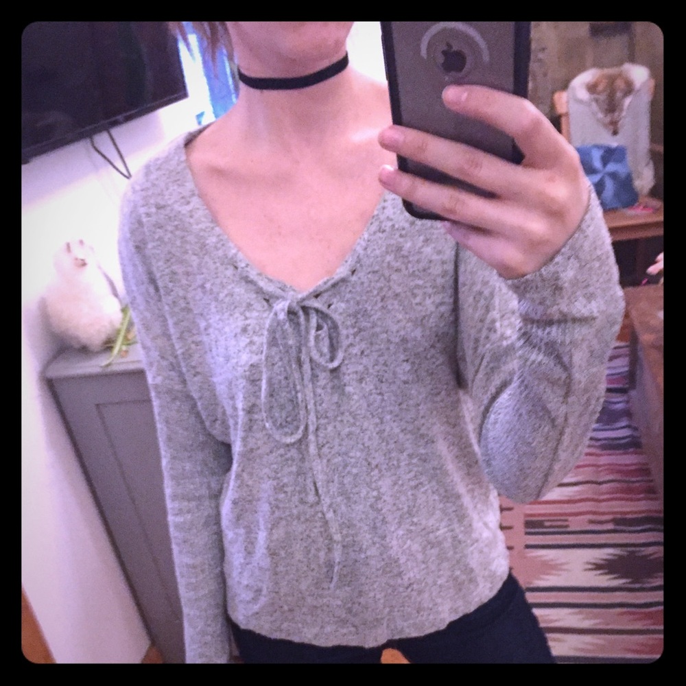 Brushed pull over with lace up detail