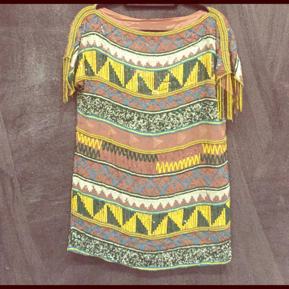 Patterned beaded dress with fringe sleeves