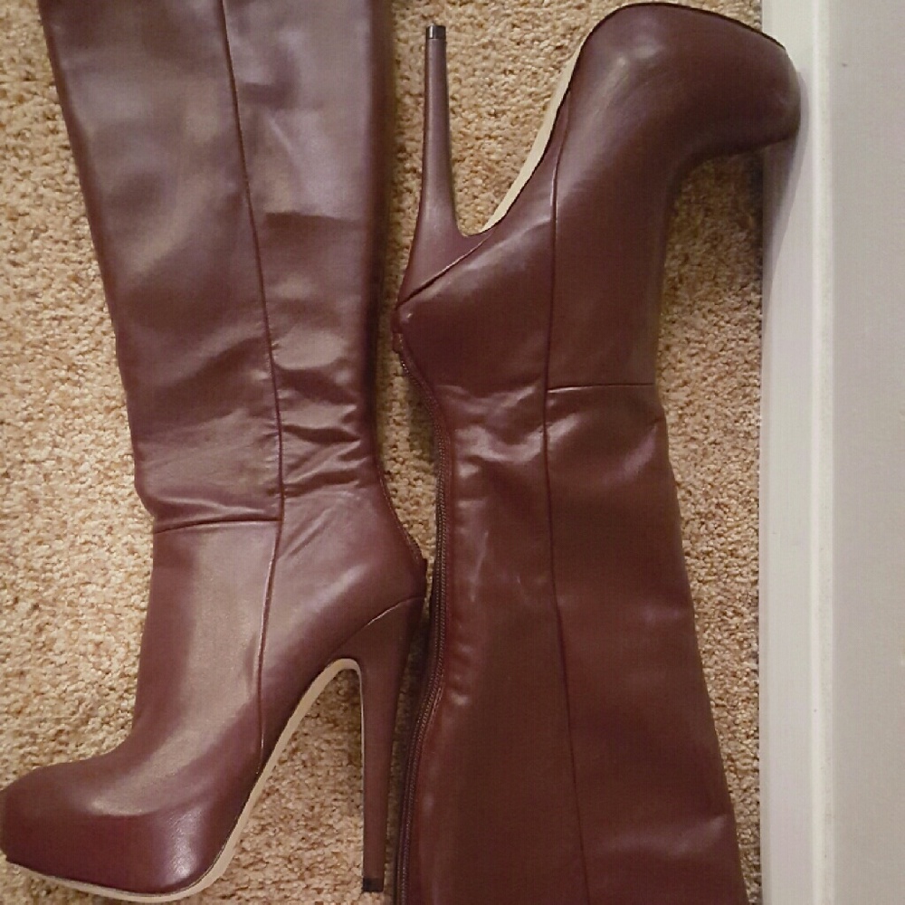 A nice gently worn pair of burgundy boots