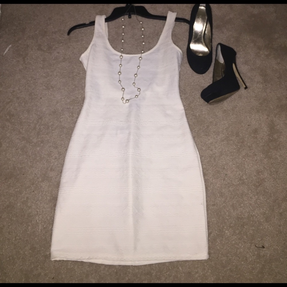 NWT Bodycon cream dress with strappy back detail