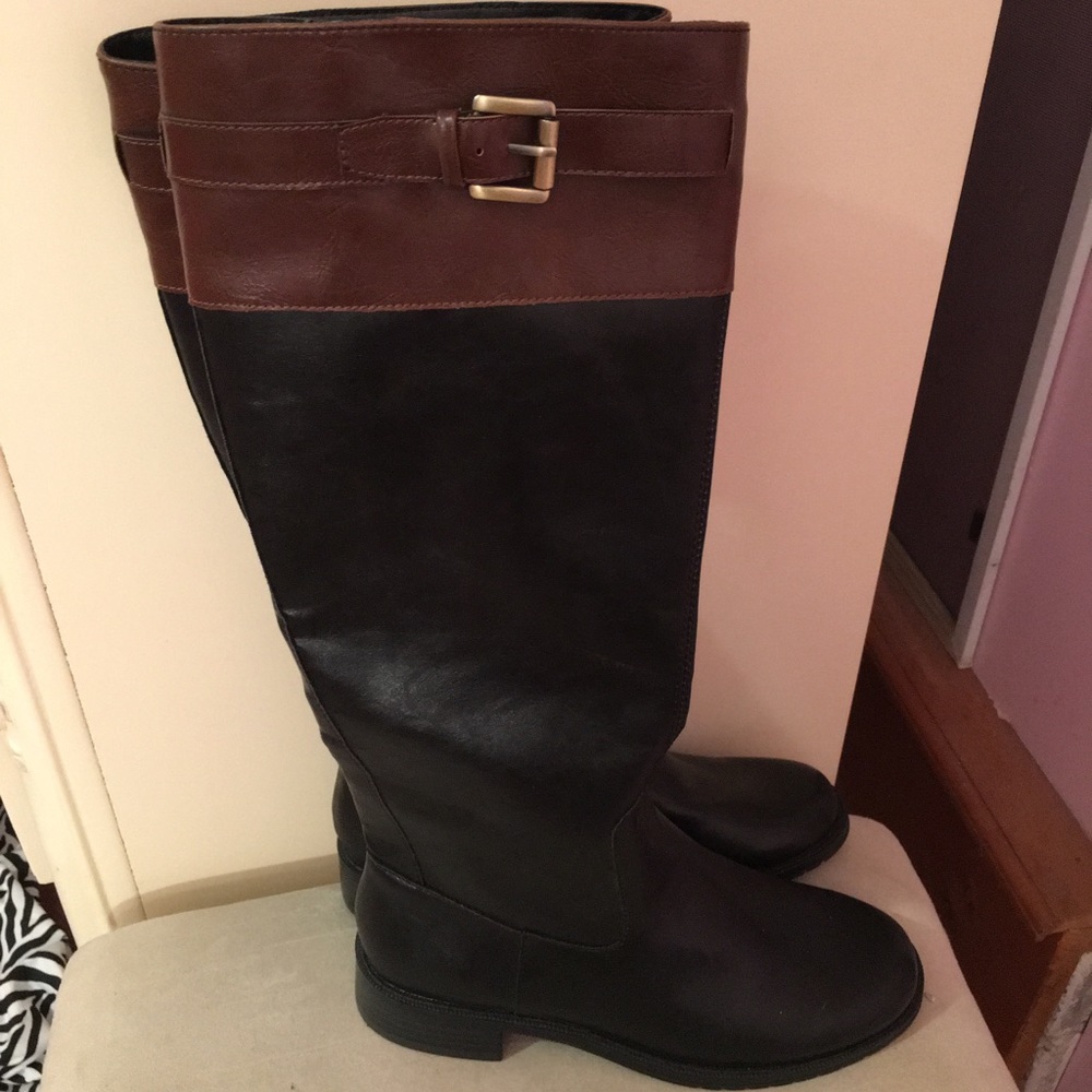 Black knee high boots with brown around the top