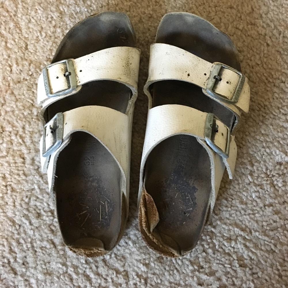 Very rough shape white Birkenstock sandals