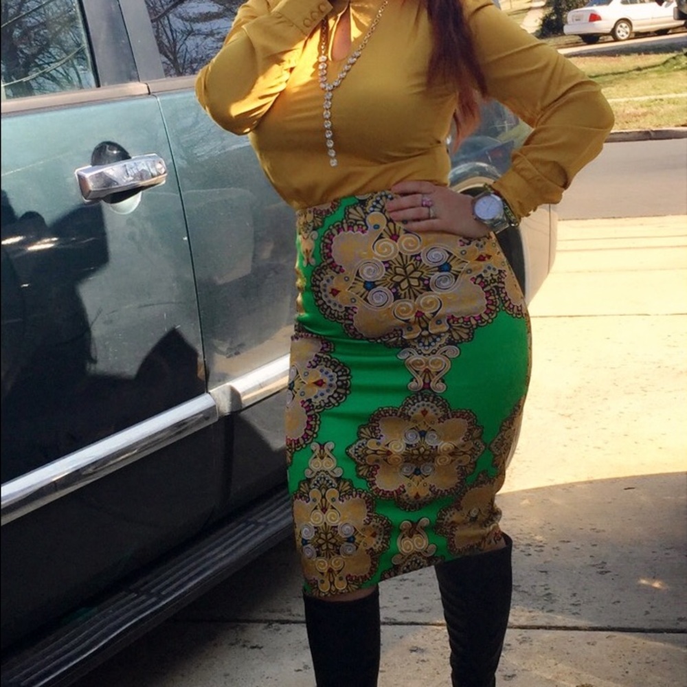 Green skirt with golden details