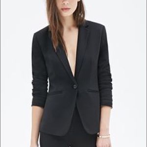 Black bolero jacket with faux leather trim