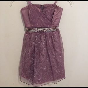 Short lavender strapless homecoming/prom dress.
