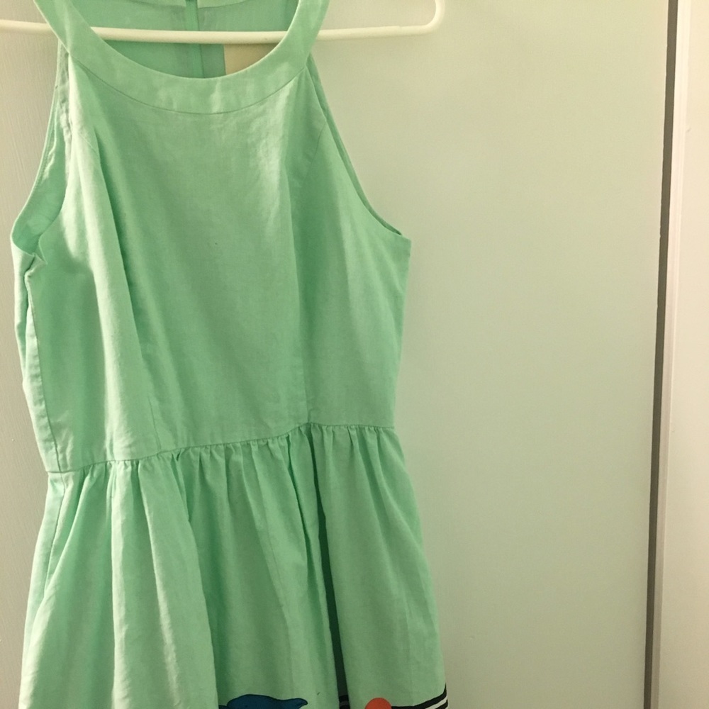 A cute teal mint green color summery dress.