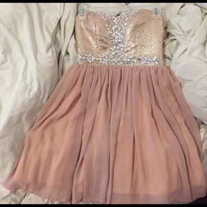 Strapless, sequined peachy pink dress for prom!