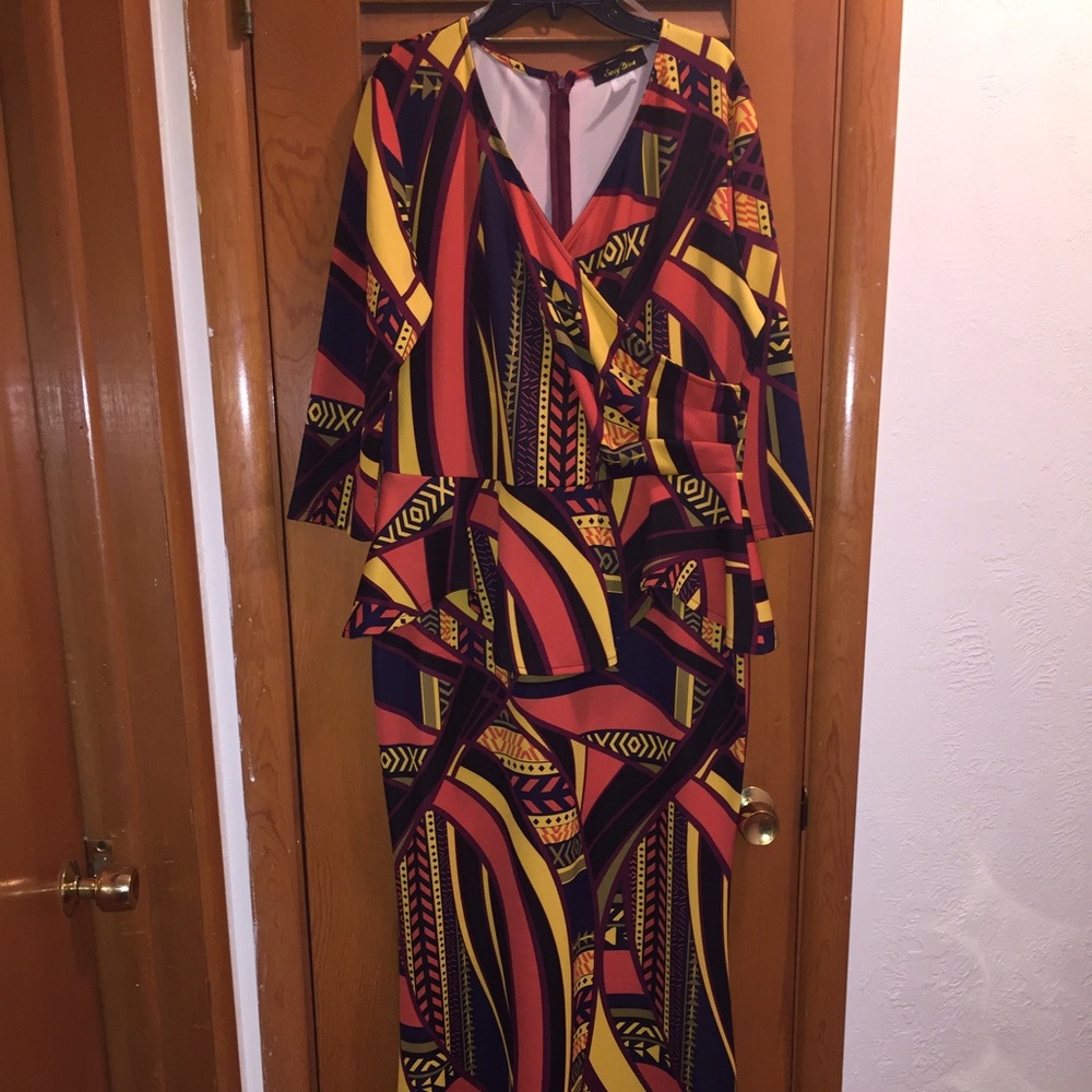 NWOT Never Worn Multi Color Peplum Dress