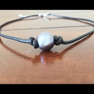 Black single pearl and leather necklace