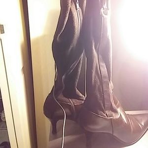 Brown pointed toe heeled boots
