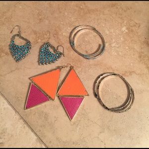 Four pairs of various earrings.