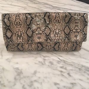 Python (faux) clutch
