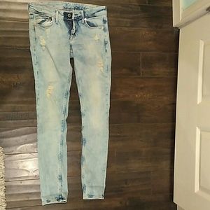 Distressed light wash jeans