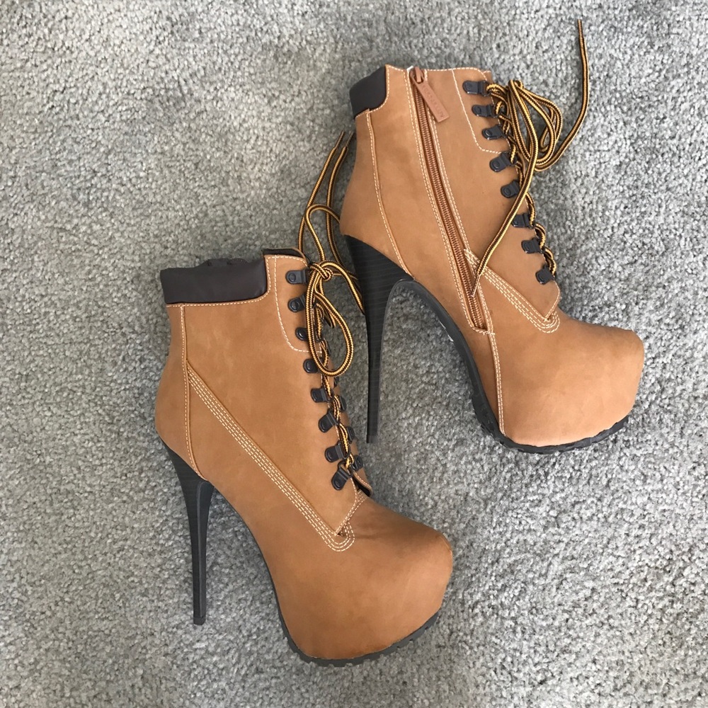 High heeled Timberland looking tan boots.