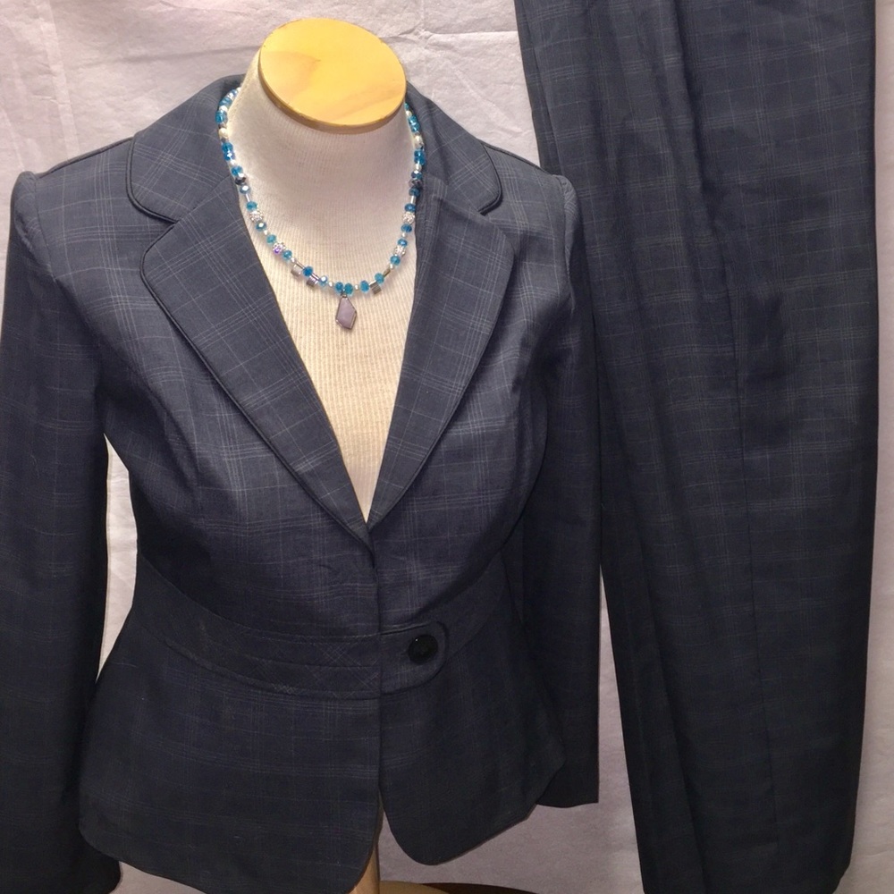 2pc. Set grey suit with tan lines.
