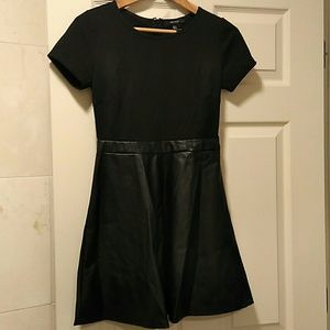 Black dress with faux leather skirt