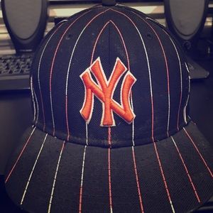 Orange pin stripe yankee hat