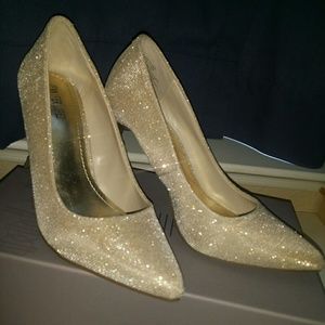 J. Lo gold sparkly heels