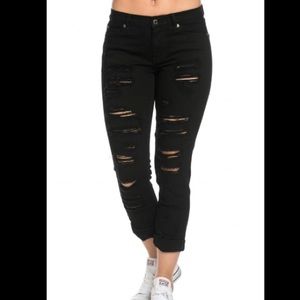 Low rise black ripped skinny jeans