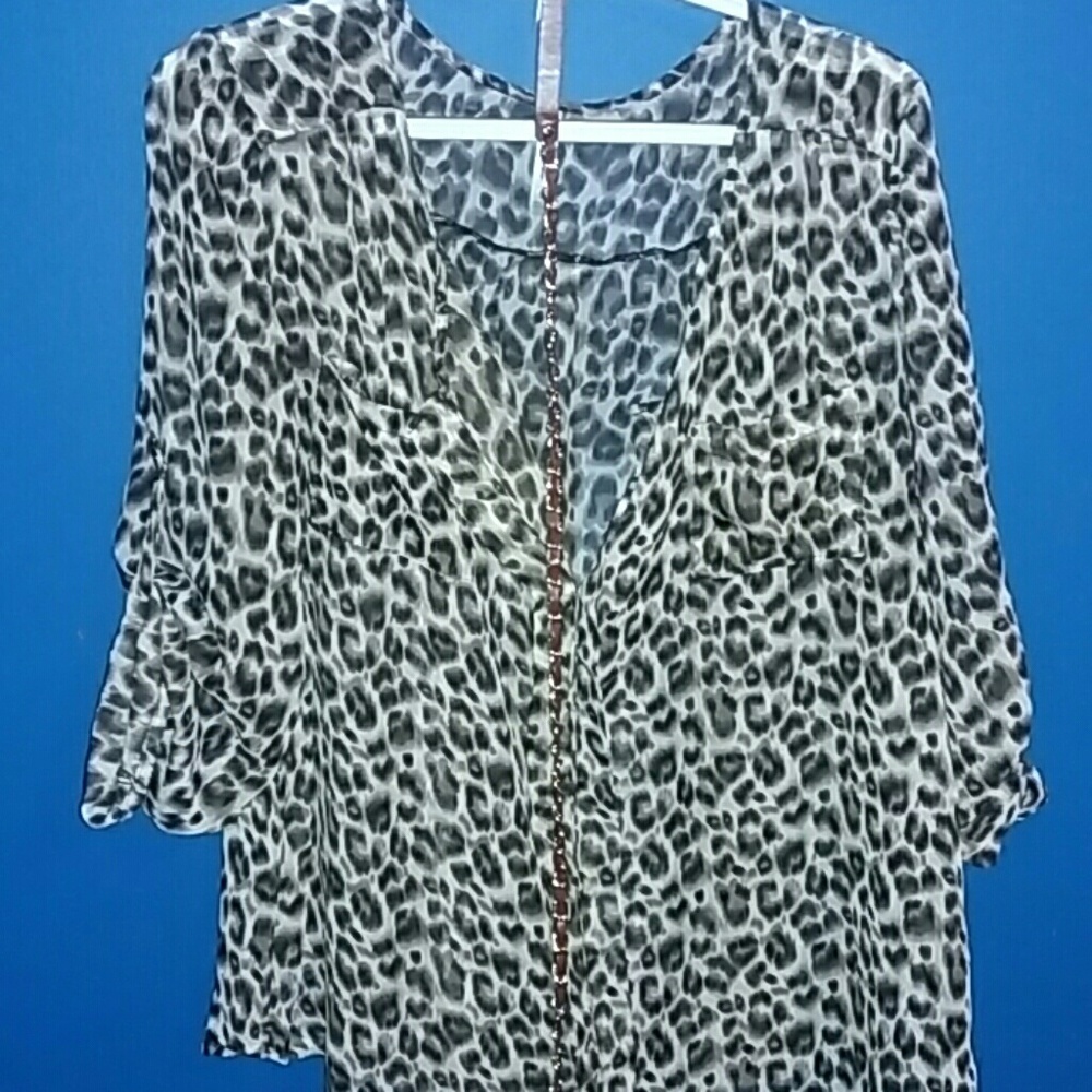 Cheetah print oversized see thru top and Belt.