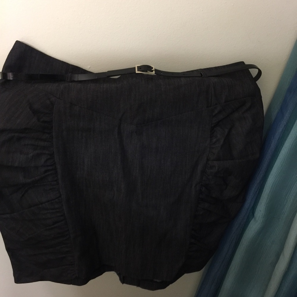 Dark grey skirt.