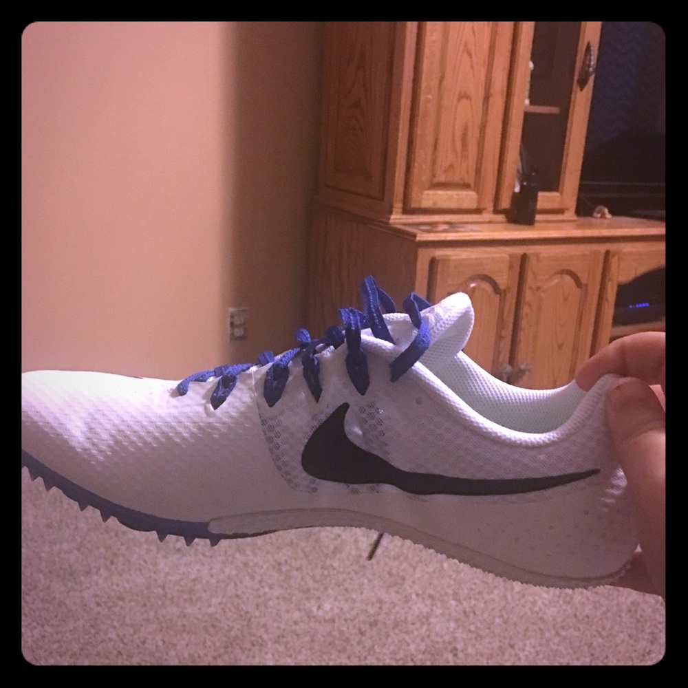 Size 12 men's track cleats never warn brand new!