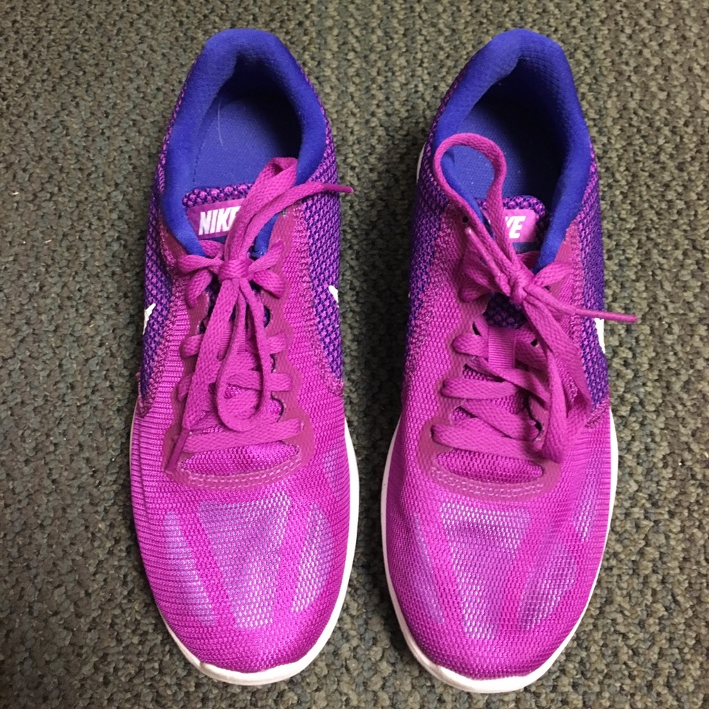 Blue and magenta Nike revolutions size 7