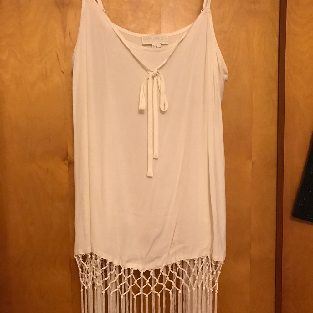 Off white spaghetti strap fringe shirt. Gorgeous !