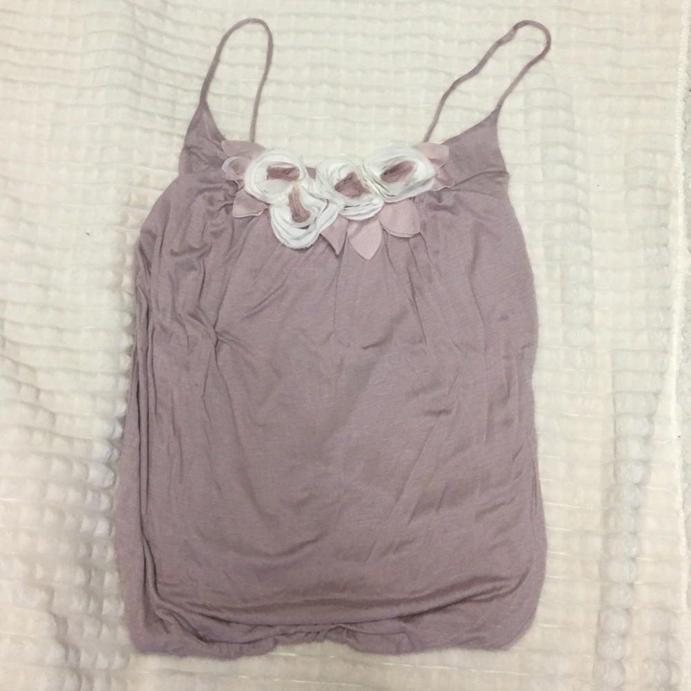 Dressy tank top with floral additions