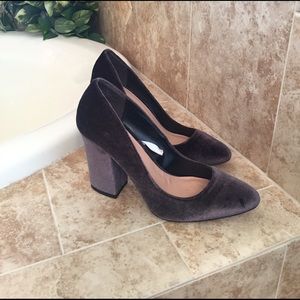 Grey velvet pumps.