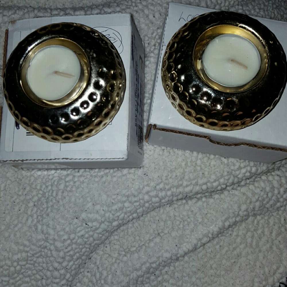NEW PAIR OF TEALIGHT HOLDER W/TEALIGHTS WILL TRADE